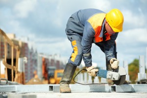 1304526-builder-working-with-cutting-grinder-m